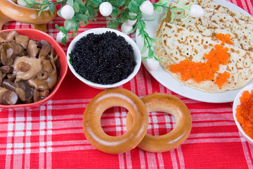 Pancakes with red and black caviar
