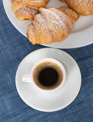 coffee cup with croissant