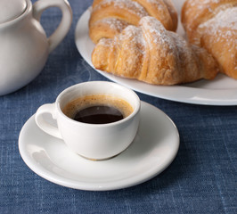 coffee cup with croissant