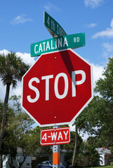 stop sign at 4-way junction in Cocoa Beach, Florida