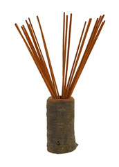 Brown incense in small wood vase