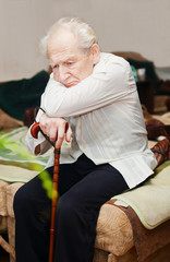 Unhappy Old Man With Cane