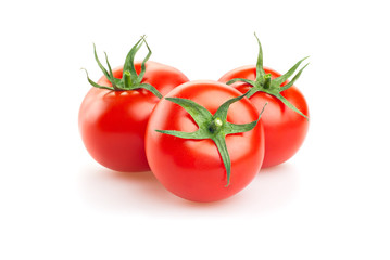 three fresh tomatoes