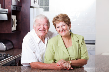 happy loving senior couple portrait at home
