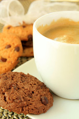 Cup of coffee with biscuits