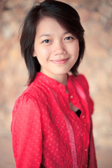 women in red shirts smiling with emotion face