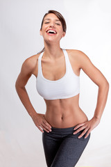 woman with abs laughing