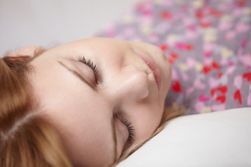Beautiful woman sleeping on sofa