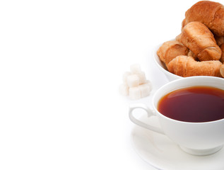 croissant with tea and sugar