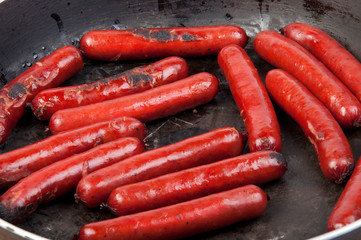 roasted sausages on the pan