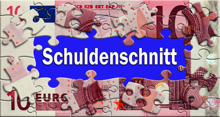 Obraz premium Schuldenschnitt - Puzzle - Geldschein
