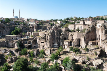 Obraz premium Rock Formation and Cave Houses in Cappadocia - Turkey