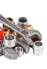 Plumbing pipe and wrench, isolated on white background