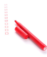 Checklist and red marker isolated on white
