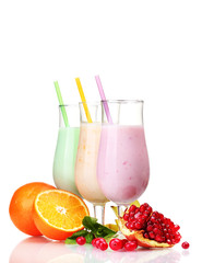 Milk shakes with fruits isolated on white