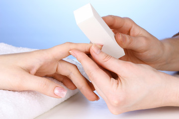Manicure process in salon