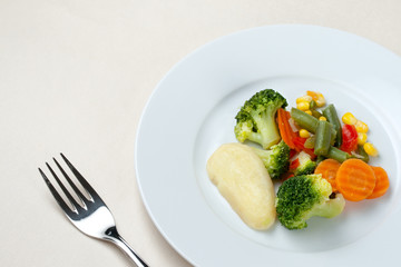 Fried vegetables on the plate