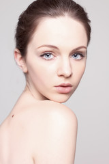 Obraz premium Closeup natural portrait of beatiful woman with big blue eyes