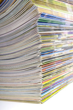 A large stack of magazines piled high