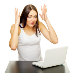 The young woman with the laptop behind a table