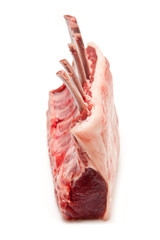 Cutlet or rack of lamb chops isolated on a white studio backgrou