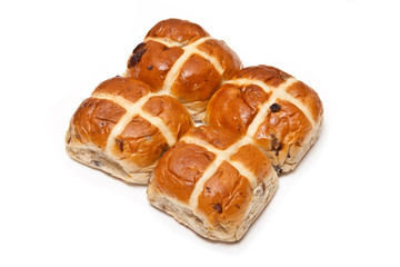 Hot cross buns isolated on a white studio background.