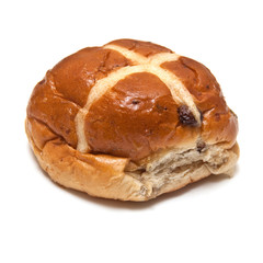 Hot cross bun isolated on a white studio background.
