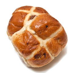 Hot cross buns on a white studio background.