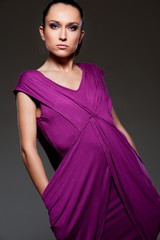 alluring woman in violet dress