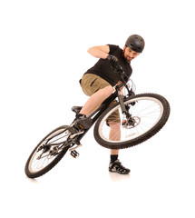 Obraz premium The bicyclist isolated on white.