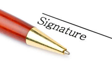 Pen and signature isolated on white