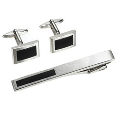 set of silver cuff links and tie pin isolated on white