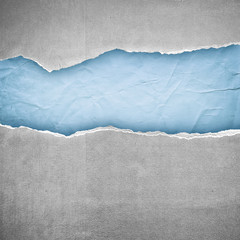rip gray end light blue paper background - obrazy, fototapety, plakaty