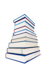 Books in high stack isolated on white