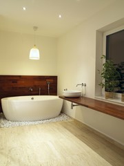 Freestanding bath in a modern bathroom interior