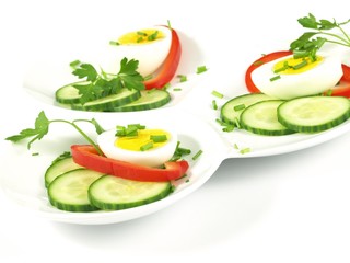 Tasty served eggs on isolated background