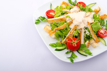 Ceasar salad served in the plate