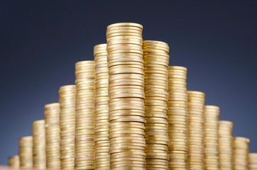 Golden coins in high stacks