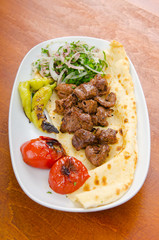 Kebab served in the plate