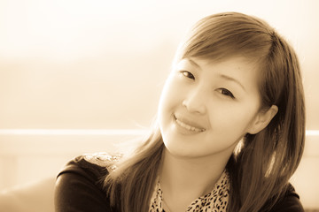 Fototapeta premium Smiling face of Asian girl