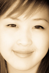 Fototapeta premium Smiling face of Asian girl