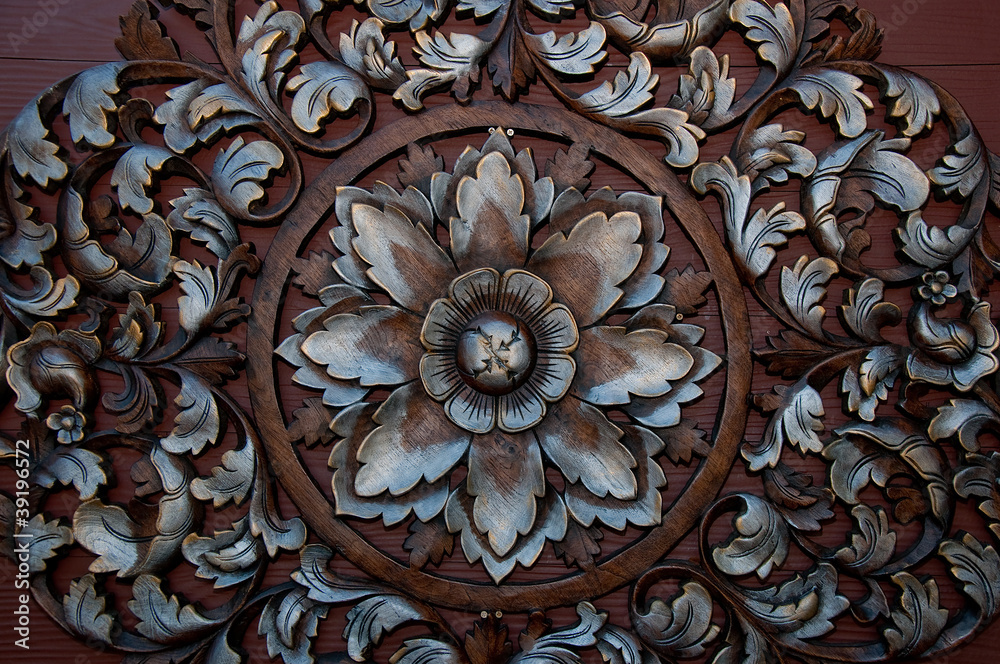 Wall mural the old carving wood ornament of flower pattern thai style