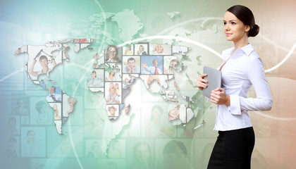 Business person against technology background