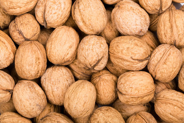 Brown walnuts textured background