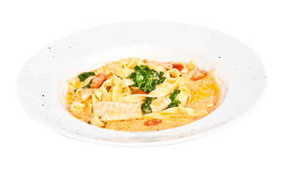 tasty pasta with cream, salmon, cheese and parsley close up