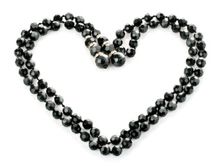 beads as heart isolated on white background