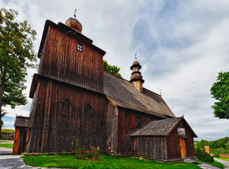 Wooden church in Rabka, Malopolska, Poland - obrazy, fototapety, plakaty
