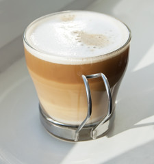 cappuccino in a glass cup  on white background