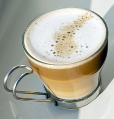 cappuccino in a glass cup  on white background