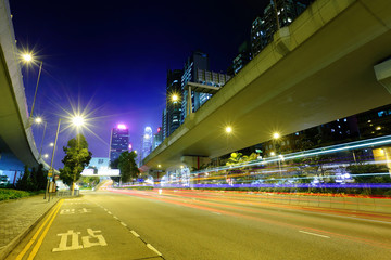 Fototapeta na wymiar highway light trails in city